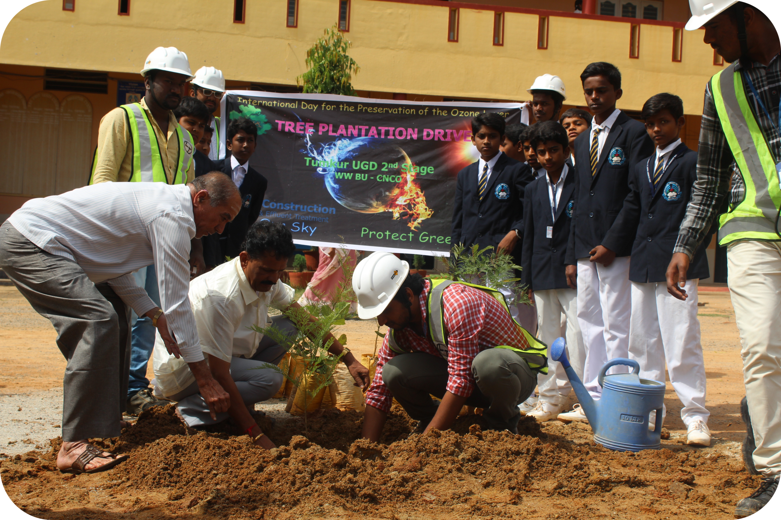 Students participating in a tree plantation drive